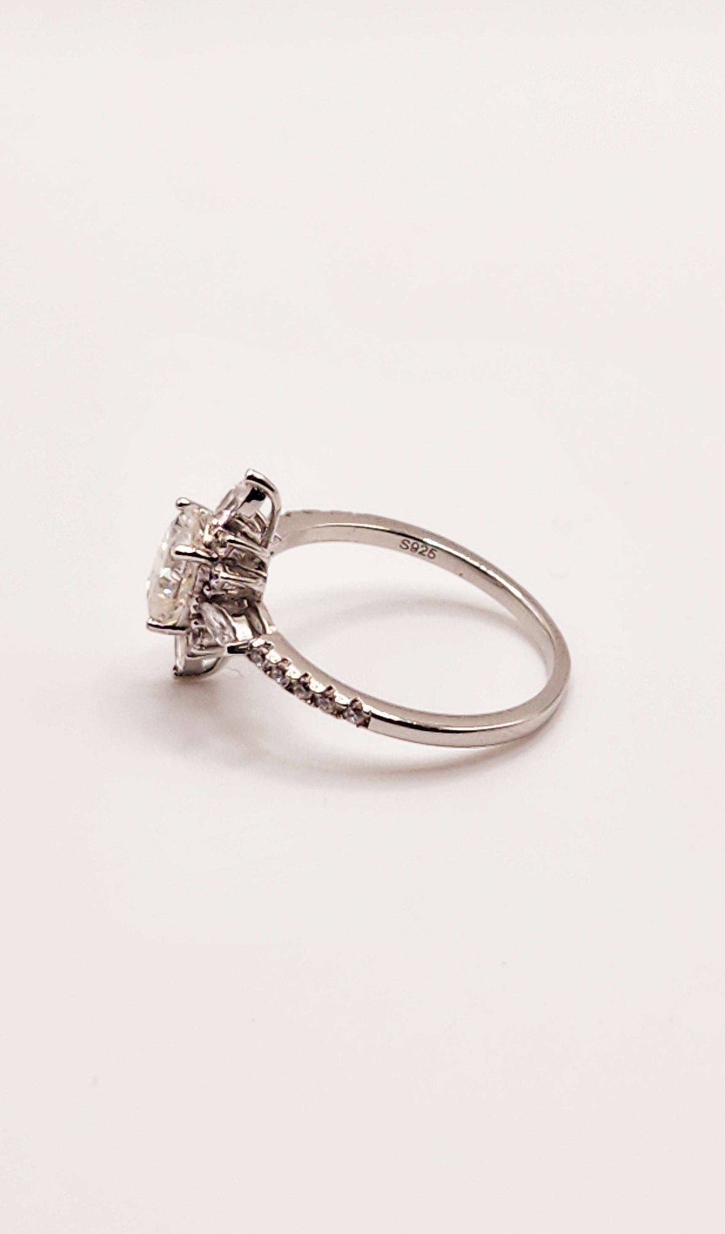 Multi Shaped Moissanite Engagement Ring in 925 Sterling Silver with Round Cut Moissanite.