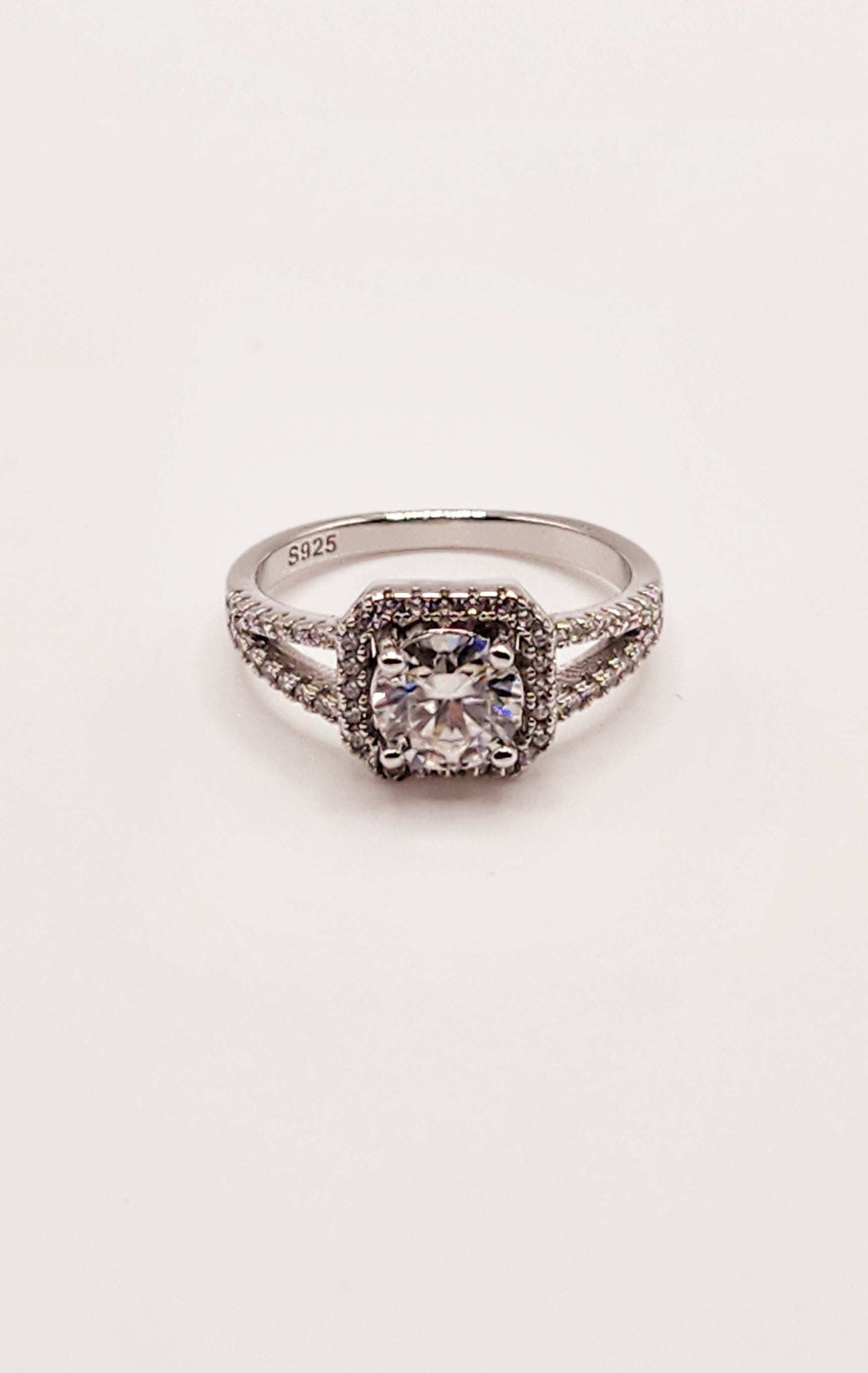 Moissanite Split Shank Square Halo Pave Engagement Ring in 925 Sterling Silver with Round Cut Moissanite.