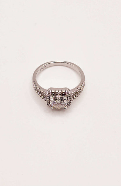 Moissanite Split Shank Square Halo Pave Engagement Ring in 925 Sterling Silver with Round Cut 1 Carat Stone.