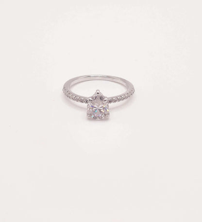 Pear Moissanite Pave Engagement Ring with 1 carat pear-shaped stone in sterling silver.