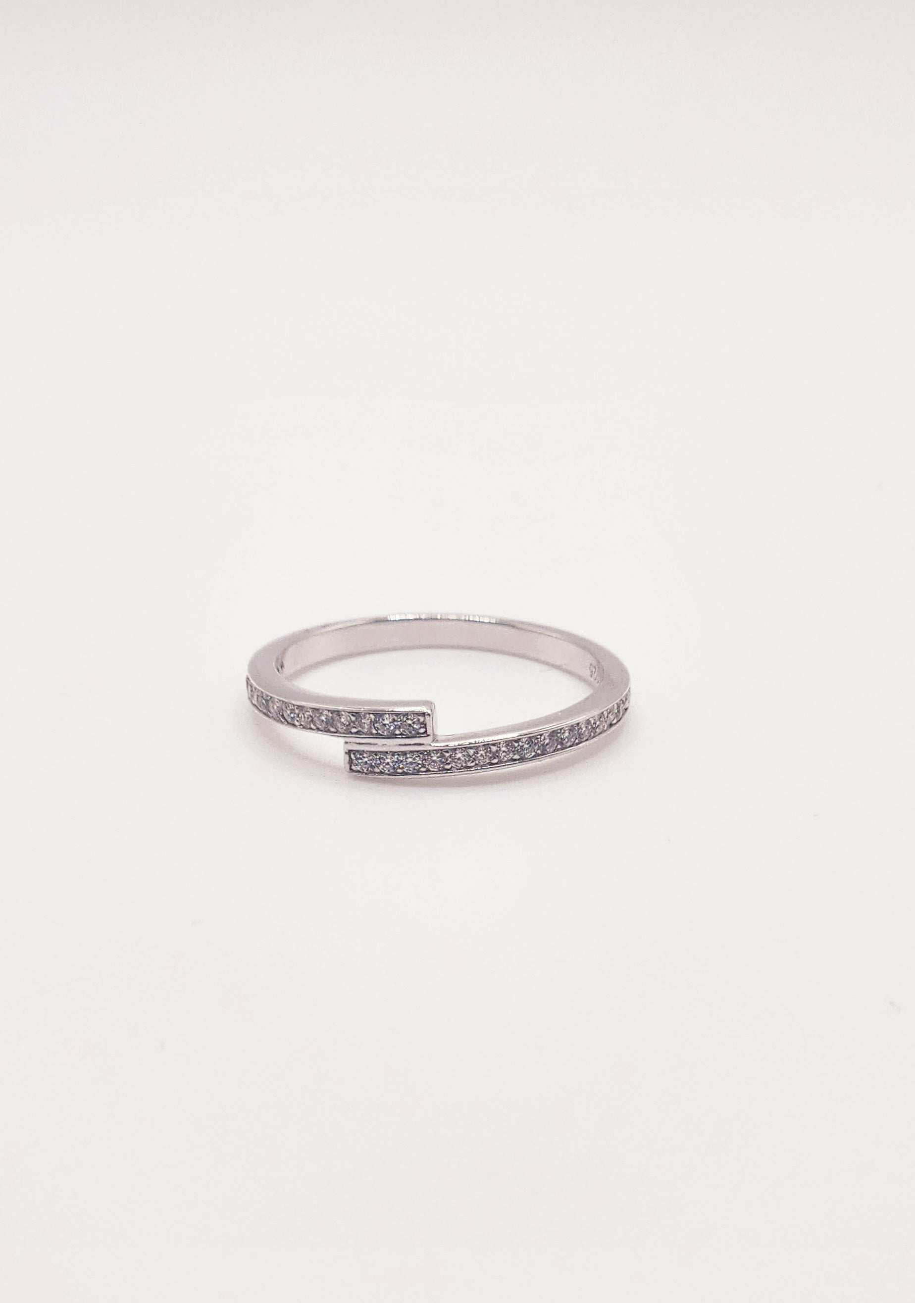 Layered Moissanite Pave and Sterling Silver Band with round stones and rhodium finish.