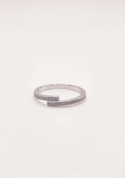 Layered Moissanite Pave and Sterling Silver Band with round stones and rhodium finish.