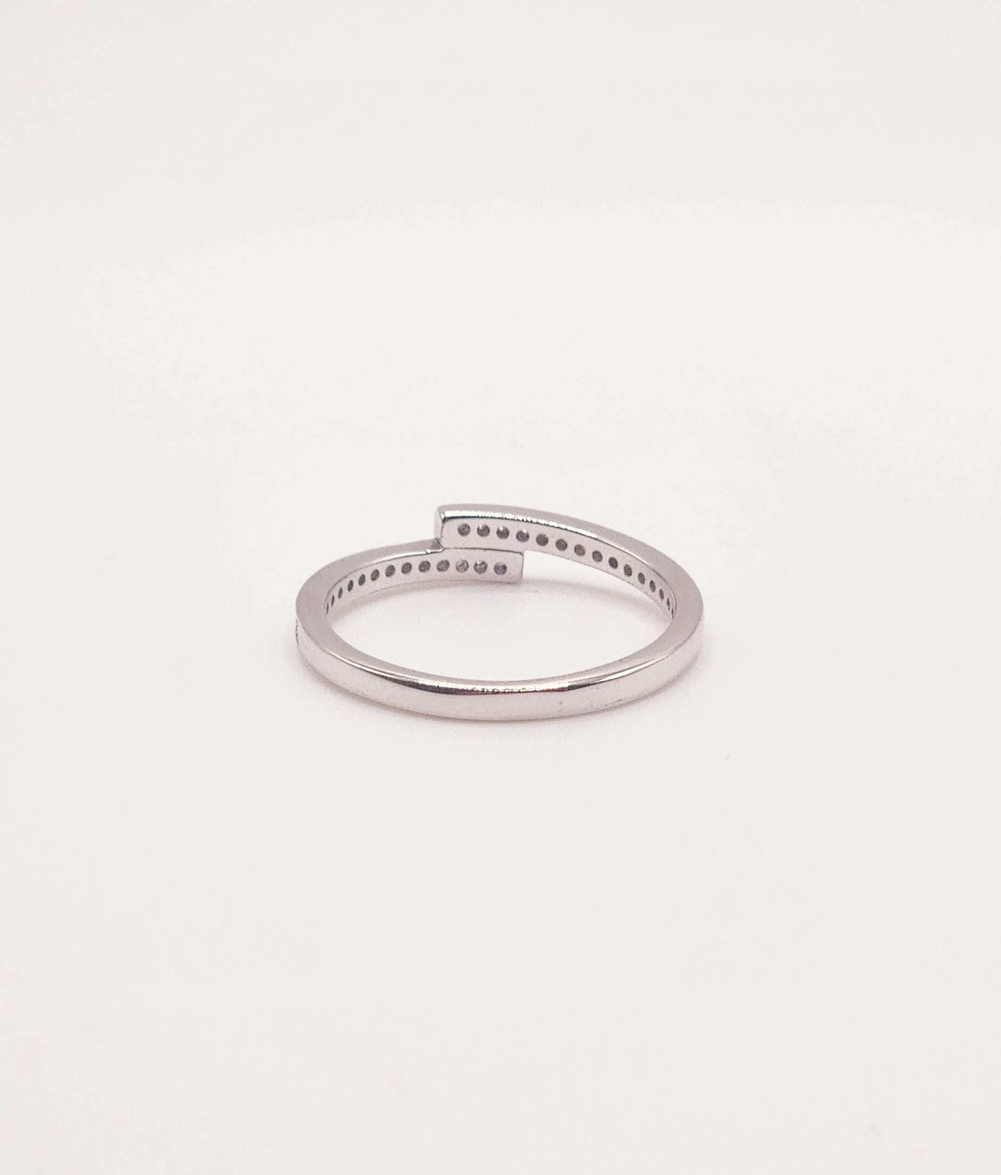 Layered Moissanite Pave and Sterling Silver Band with elegant design and rhodium finish.