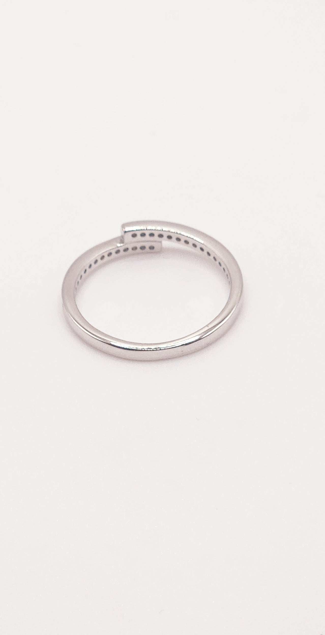 Layered Moissanite Pave and Sterling Silver Band with intricate design in rhodium finish.