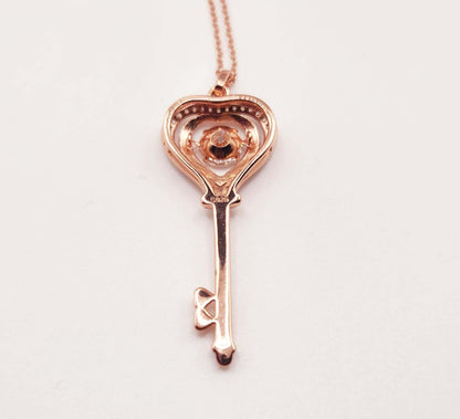 925 silver rose gold plated key pendant necklace with moissanite stone.