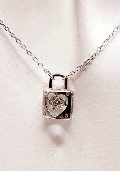 Elegant Dancing Gemstone Love Lock Pendant with sparkling round cut stone in 925 sterling silver.