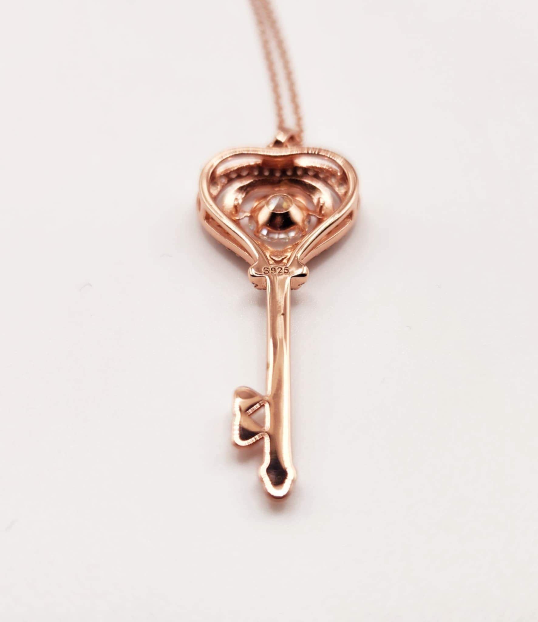 925 silver rose gold plated key pendant necklace with moissanite stone.