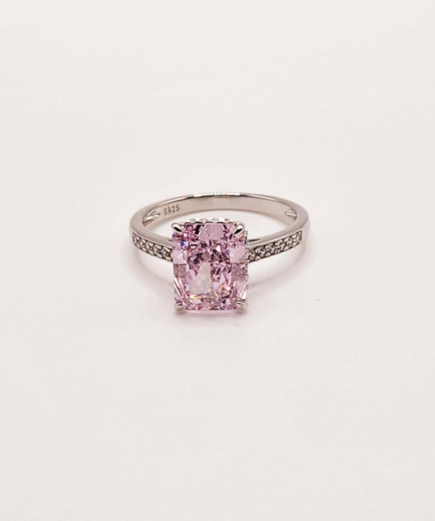 Classic pink radiant cut sterling silver ring with a 2.5 carat baguette pink stone.