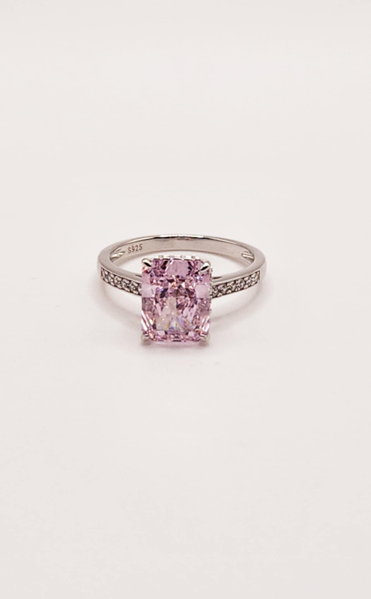 Classic Pink Radiant Cut Sterling Silver Ring with 2.5 carat pink stone and sterling silver band.