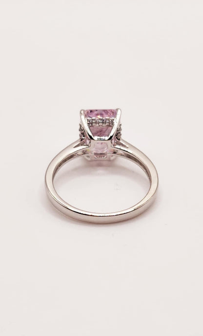 Classic pink radiant cut sterling silver ring with a 2.5 carat baguette stone.